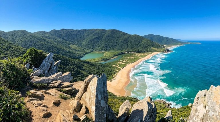 Panoramic coastal landscape with turquoise ocean, remote beach, mountains, and lagoons on Santa Catarina Island