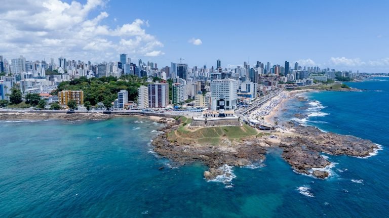 Where to stay in Brazil - Coastal view of Salvador with Barra Lighthouse and city skyline
