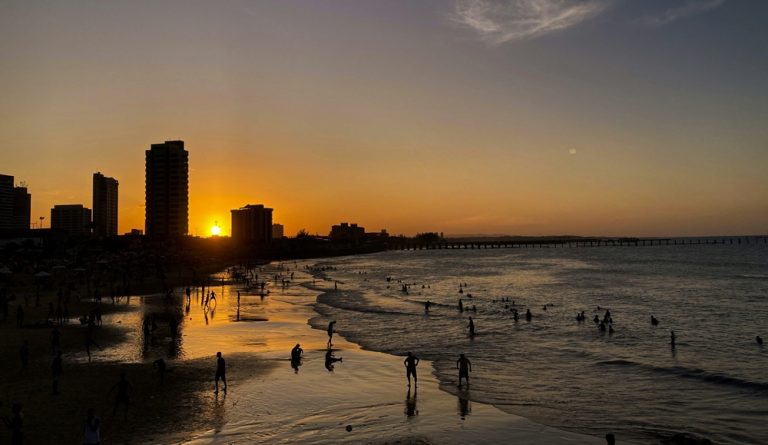 Sunset beach scene in Fortaleza featured in this Northeast Brazil travel guide Caption: Description: