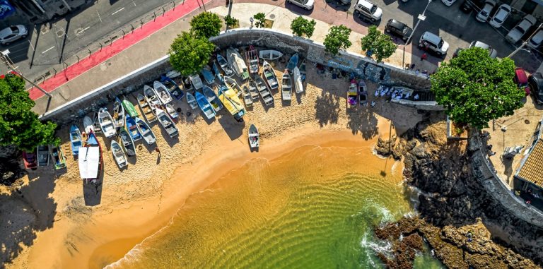 Coastal beach cove in Rio Vermelho showing where to stay in Salvador, Brazil Caption: Description: