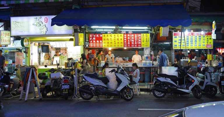 Taipei street food stalls at night near some of the best areas to stay in Taipei Caption: Description: