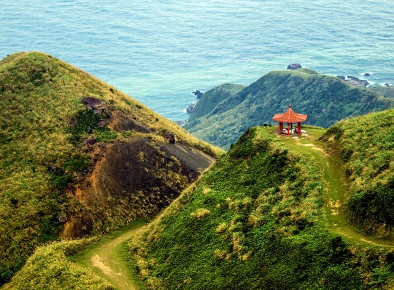 Scenic coastal hiking trail and pavilion in Taiwan overlooking the ocean - Taiwan travel budget guide