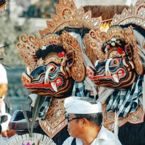 Traditional Balinese cultural ceremony and ornate festival masks in Bali – is Bali safe for tourists exploring local culture