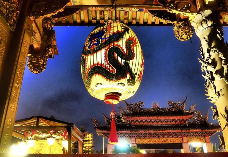 Traditional Taiwanese lantern and temple at night in Taipei, near some of the best areas to stay in Taipei