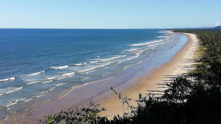Long tropical beach coastline showcasing the natural beauty of the best islands in Brazil