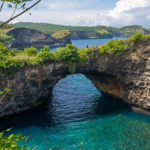 Broken Beach at Nusa Penida featured in this Nusa Penida travel guide, showing the island's famous natural rock arch and turquoise ocean