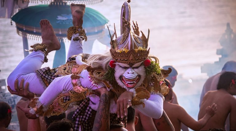 Traditional Kecak Fire Dance performer during a cultural performance in this Uluwatu travel guide