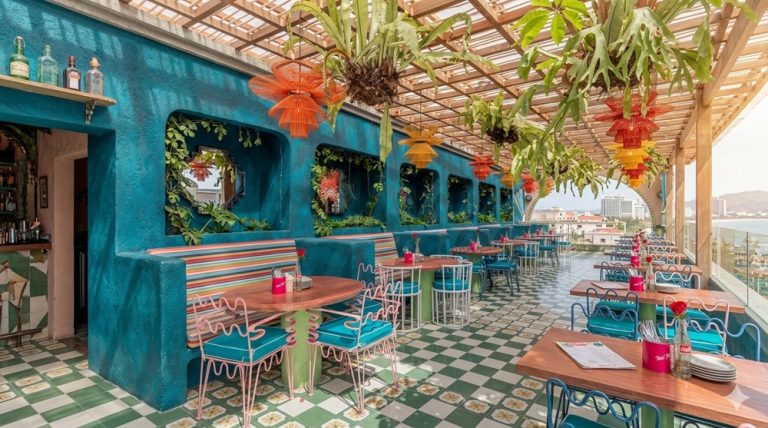 Colorful dining area inside Motel Mexicola in Seminyak, Bali Caption: Description: