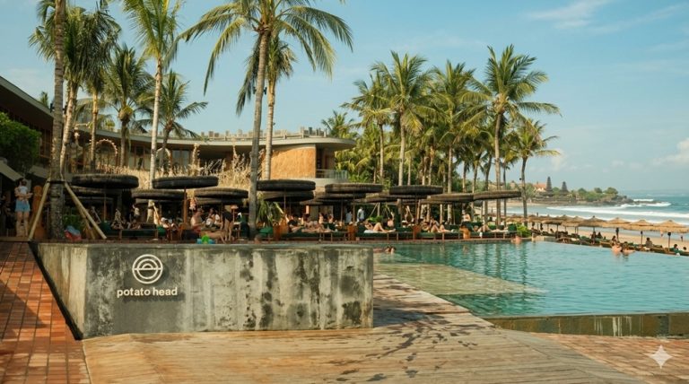 Visitors relaxing at Potato Head Beach Club in Seminyak with ocean views and an infinity pool Caption: Description:
