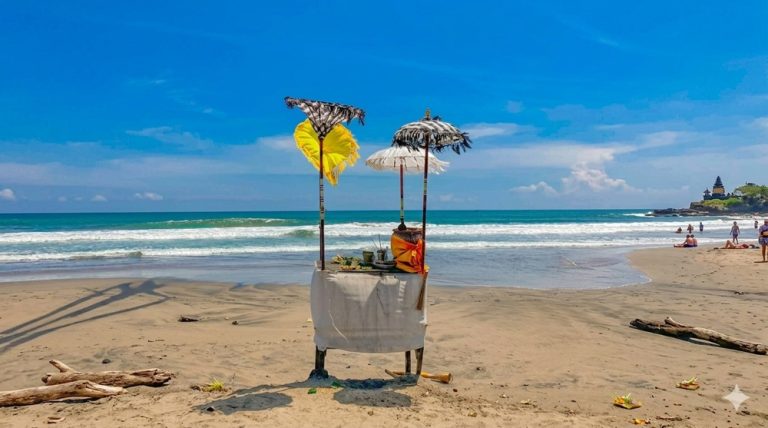 Traditional Balinese beach shrine and offering overlooking the ocean on Bali's coastline Caption: Description: