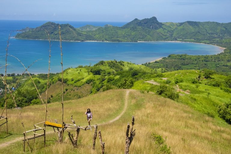 Panoramic view from Bukit Merese overlooking Tanjung Aan Bay and the southern coastline near Kuta Lombok, Indonesia. Caption Description
