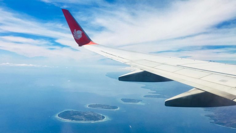 View of the Gili Islands from an airplane approaching Lombok International Airport in Indonesia.