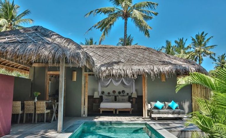 Private pool villa at Hakuna Matata Resort Gili Air surrounded by tropical gardens and traditional Indonesian architecture.