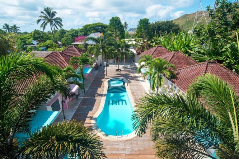 Mad Monkey Kuta Lombok hostel with outdoor swimming pool, tropical gardens and private bungalows in Kuta Lombok, Indonesia.