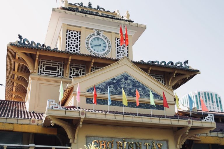 Binh Tay Market clock tower and traditional architecture in Ho Chi Minh City's Cholon district Caption: Description: