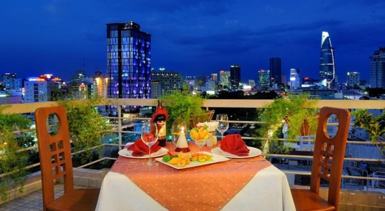 Rooftop restaurant at Elios Hotel in Ho Chi Minh City offering panoramic skyline views, making it a great choice for travellers staying in District 1.