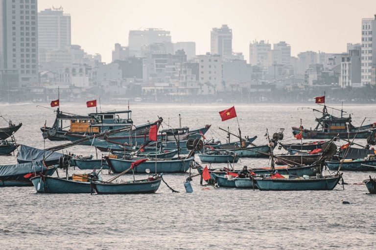Traditional fishing boats in Da Nang Bay, one of the fascinating places to visit in Vietnam Caption Description