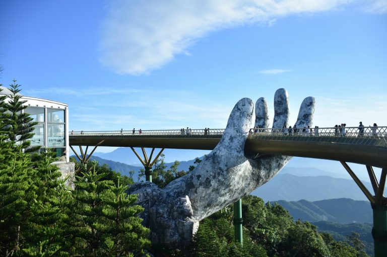 Golden Bridge supported by giant stone hands at Ba Na Hills in central Vietnam