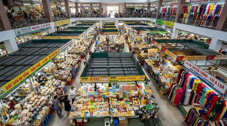 Colourful food, clothing and souvenir stalls inside Han Market in Da Nang Caption: Description: