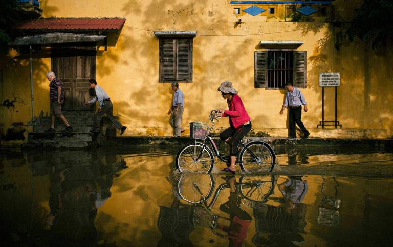 Things to do in Hoi An include exploring the historic streets of Hoi An Ancient Town, seen here during seasonal flooding.