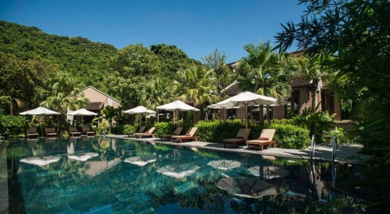 Swimming pool at Nham Village Resort in Ninh Binh, a peaceful luxury retreat surrounded by nature