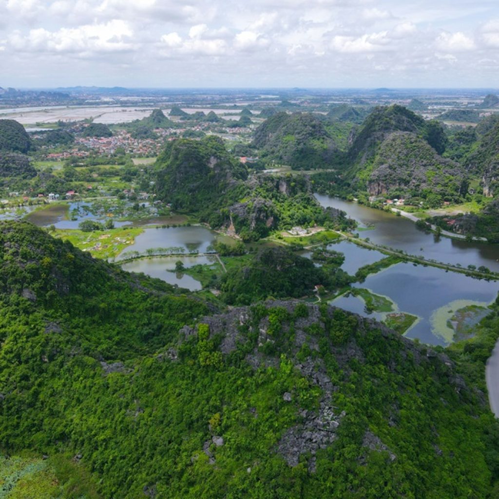 Things to do in Ninh Binh - panoramic view of limestone karst mountains, waterways and countryside