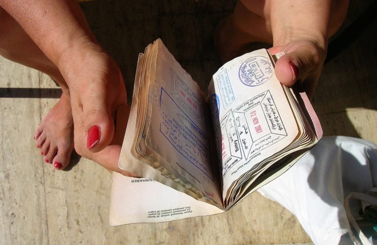 Vietnam Visa Guide - Passport with immigration entry and exit stamps