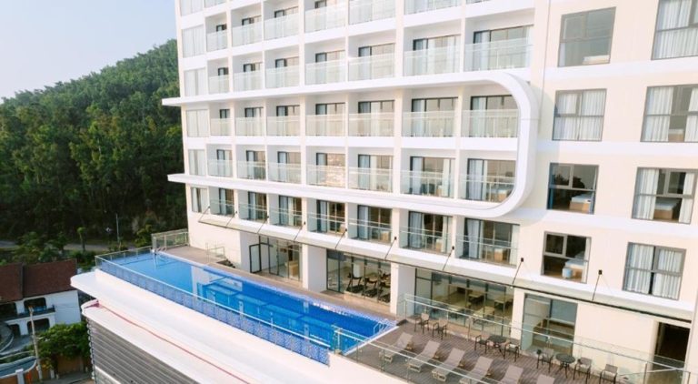 Outdoor swimming pool at The Golden Crest Hotel Quy Nhon near the city's beachfront and promenade Caption Description