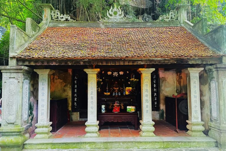 Traditional stone temple surrounded by greenery at Bich Dong Pagoda in Ninh Binh