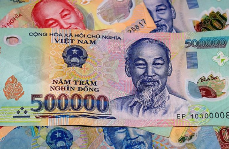 Vietnamese đồng banknotes, illustrating Vietnam travel tips for understanding the local currency and managing money during your trip.
