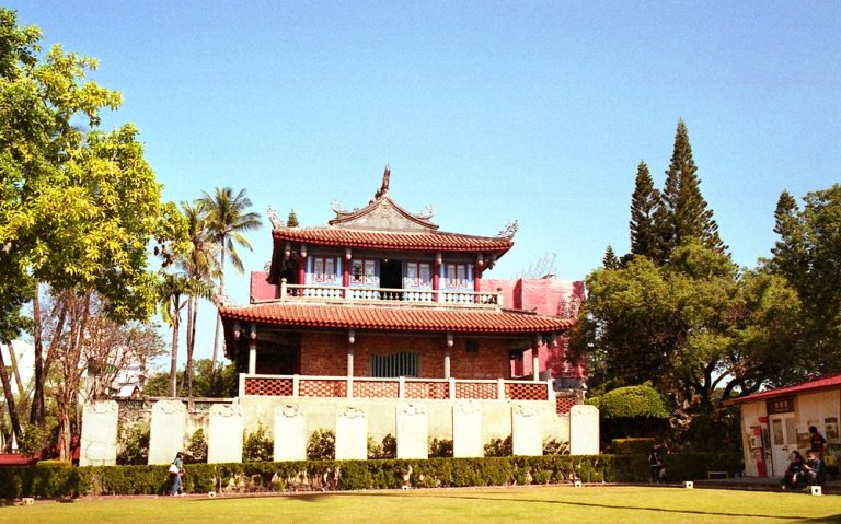 Historic Chihkan Tower building surrounded by gardens and trees in Tainan Caption Description