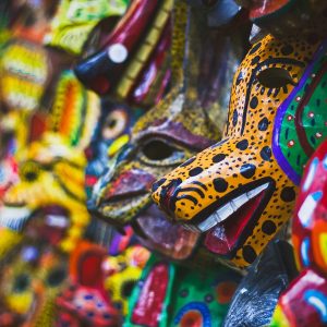 Colourful traditional masks representing Maya culture and handicrafts among the things to do in Guatemala
