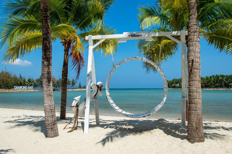 Tropical beach and turquoise water during an island hopping trip in Nha Trang Bay, Vietnam