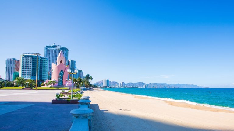 Nha Trang Beach with its sandy coastline, Tran Phu waterfront, city hotels and mountains in the distance